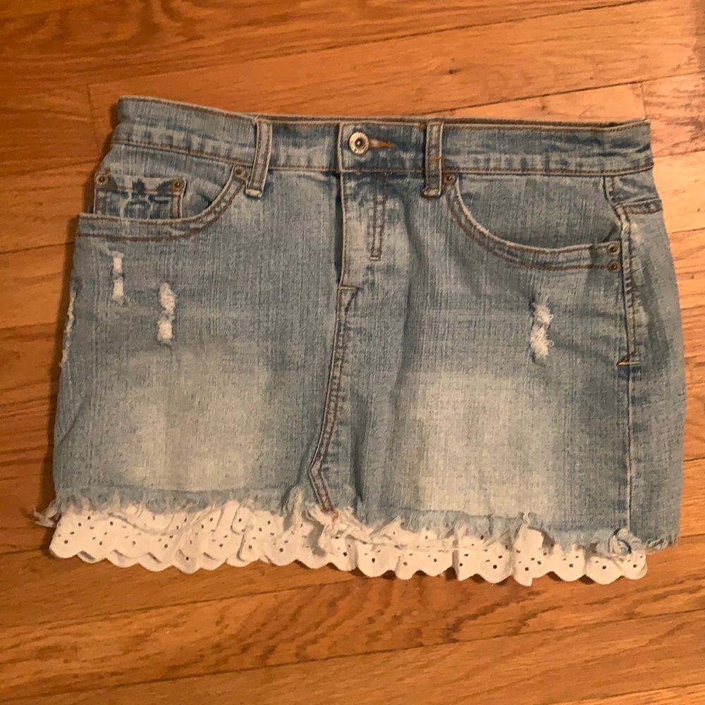 Distressed denim mini skirt with lace layer